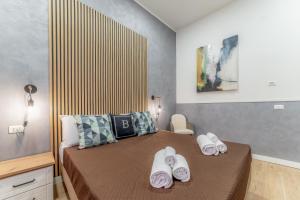 Una cama o camas en una habitación de Bello Urban Boutique - Golden Keys Collection 27 fotos más