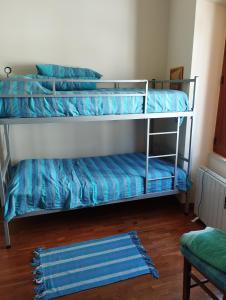 Postel nebo postele na pokoji v ubytování Dom Camilo Alojamento local