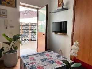 TV a/nebo společenská místnost v ubytování DMC - Alloggio Turistico