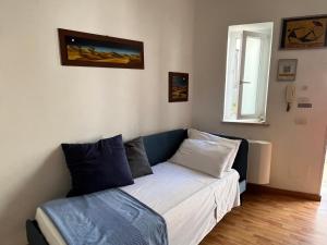 Postel nebo postele na pokoji v ubytování DMC - Alloggio Turistico