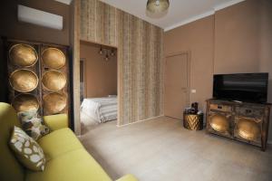 TV a/nebo společenská místnost v ubytování Boutique Suites Valadier