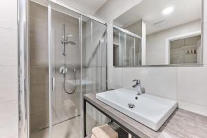 Koupelna v ubytování Apartmány Elite - Frištenského