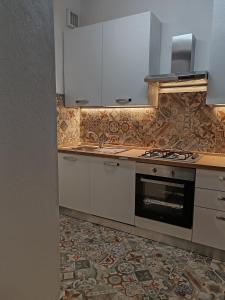 Kuchyň nebo kuchyňský kout v ubytování Casa del Prof - Casa vacanze in centro storico