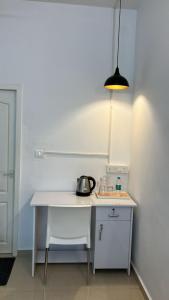 Kuchyň nebo kuchyňský kout v ubytování Madras Inn Nungambakam