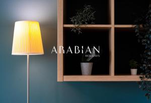 Et logo, certifikat, skilt eller en pris der bliver vist frem på Beautiful Newly Renovated Studio - JLT Dubai