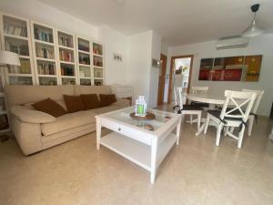 A seating area at Delfines III Solo Familias Serviplaya