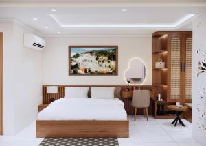 Postel nebo postele na pokoji v ubytování En Hotel Sapa