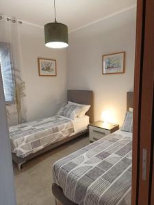 Ένα ή περισσότερα κρεβάτια σε δωμάτιο στο B&B costa d'abruzzo