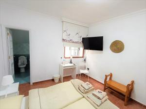 Postel nebo postele na pokoji v ubytování Rincón de Joel Habitación con baño privado