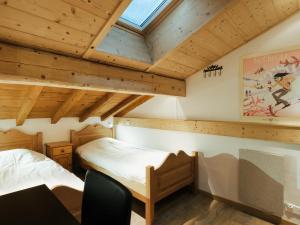 Кровать или кровати в номере Appartement 3* proche pistes, 77m², WIFI, Parking - FR-1-304-222