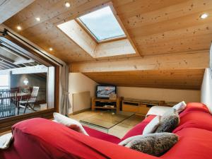 Телевизор и/или развлекательный центр в Appartement 3* proche pistes, 77m², WIFI, Parking - FR-1-304-222