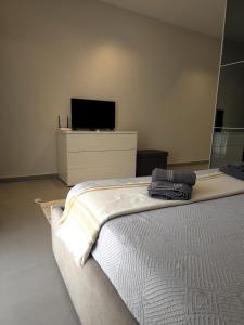 Voodi või voodid majutusasutuse The Msida View apartment toas