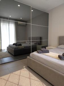Postel nebo postele na pokoji v ubytování The Msida View apartment