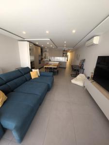 TV a/nebo společenská místnost v ubytování The Msida View apartment