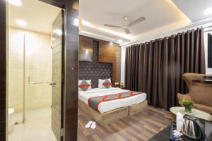 Postel nebo postele na pokoji v ubytování Hotel Gold Souk - Karol Bagh