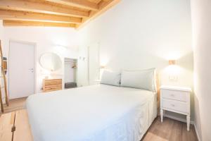 Postel nebo postele na pokoji v ubytování B&B La Volpe