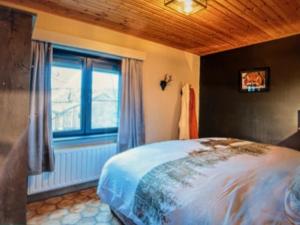 Postel nebo postele na pokoji v ubytování Le Petit Erezée