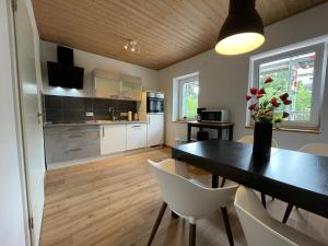 Kuchyň nebo kuchyňský kout v ubytování Dill Apartment Pleinfeld am Brombachsee I