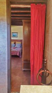 Ein Bett oder Betten in einem Zimmer der Unterkunft La Casa de la Vieja