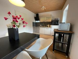 Kuchyň nebo kuchyňský kout v ubytování Dill Apartment Pleinfeld am Brombachsee I