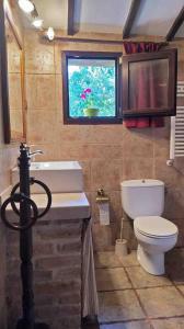 Ein Badezimmer in der Unterkunft La Casa de la Vieja