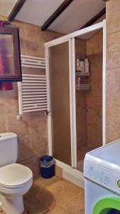 Ein Badezimmer in der Unterkunft La Casa de la Vieja