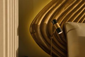 a microphone in a room next to a curtain at Vila Foz Hotel & SPA - member of Design Hotels in Porto