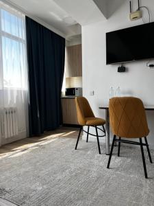 TV a/nebo společenská místnost v ubytování Hyat apartment