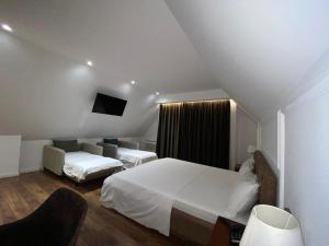 Voodi või voodid majutusasutuse Hotel Vila Zeus toas