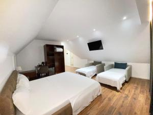 Voodi või voodid majutusasutuse Hotel Vila Zeus toas