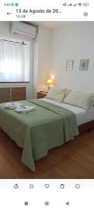 Postel nebo postele na pokoji v ubytování Monoambientes Peatonal - con cochera
