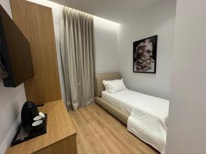 Voodi või voodid majutusasutuse Hotel Vila Zeus toas