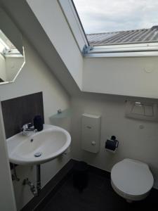 Koupelna v ubytování Loft Ziegelei + 35 fotografií