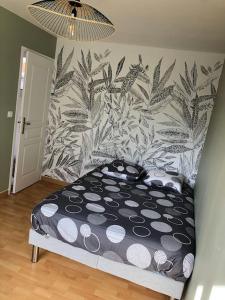 En eller flere senge i et værelse på Etaples maison de ville , maison de pêcheur