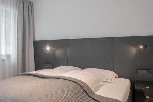 Postel nebo postele na pokoji v ubytování Chalet Madlein