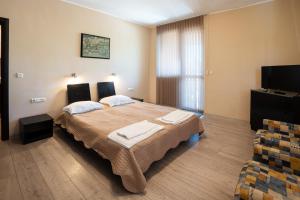 Ένα ή περισσότερα κρεβάτια σε δωμάτιο στο Guest House La Casa