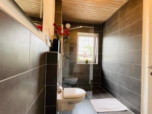 Koupelna v ubytování Dill Apartment Pleinfeld am Brombachsee I