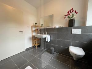 Koupelna v ubytování Dill Apartment Pleinfeld am Brombachsee I