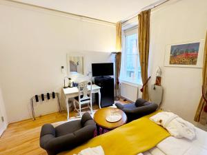 TV a/nebo společenská místnost v ubytování Hotel Concordia
