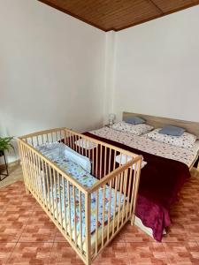 Postel nebo postele na pokoji v ubytování Hřensko 27 Apartmány