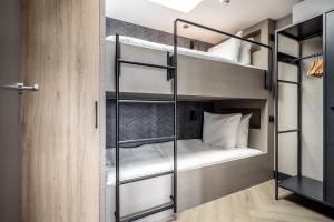 Postel nebo postele na pokoji v ubytování BizStay Delft