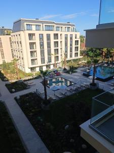 an aerial view of a building with a pool at Cozy flat Азур in St. St. Constantine and Helena