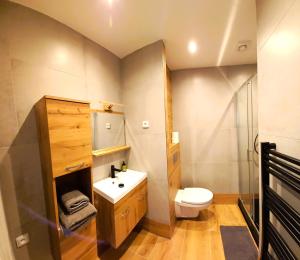 Koupelna v ubytování Apartmán u lanovky