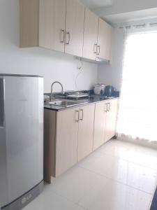 Η κουζίνα ή μικρή κουζίνα στο LM Trav accommodation and reservation services