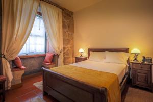 Uma cama ou camas num quarto em Quinta do Terreiro - Turismo de Habitacao