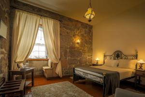 Uma cama ou camas num quarto em Quinta do Terreiro - Turismo de Habitacao