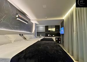 Ein Bett oder Betten in einem Zimmer der Unterkunft LM Get One