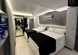 Ein Bett oder Betten in einem Zimmer der Unterkunft LM Get One