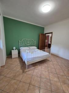 Postel nebo postele na pokoji v ubytování Madì House