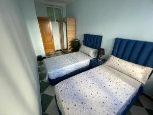 Letto o letti in una camera di Comfy Stay in Larache's Center